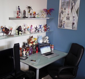 Comfy-Anime-Themed-Workspace-Design-with-Comic-Figurines-in-the-Shelves