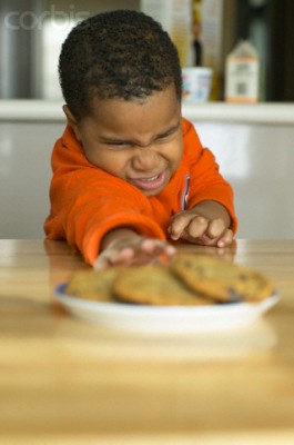 Little Boy Reaching out to Cookies