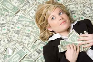 woman-lies on a bed of-money2